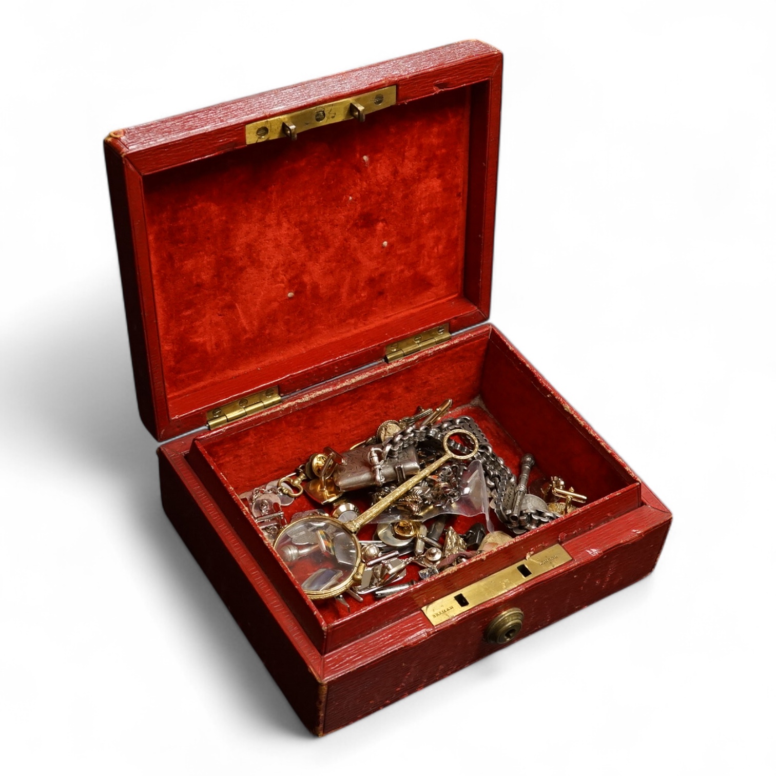 A small group of assorted jewellery and other items including a Victorian white metal albert, hung with a silver vesta case, a pair of gilt metal lorgnettes, cufflinks, scarab brooch and a white metal propelling pencil,